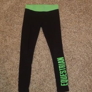 Justice Bottoms - Green and black justice equestrian leggings. Justice Bottoms - Green and black justice equestrian leggings.